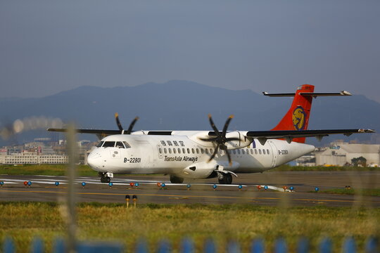TransAsia ATR 72 taxis on runway.