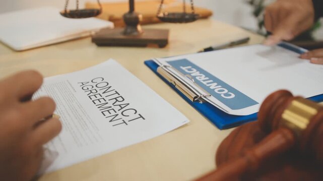 Lawyer explained to the client about the law that must be brought against the court case.