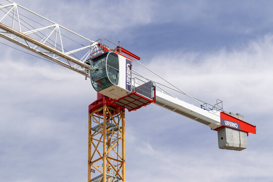 Nancy, France - July 11th 2026 : View on a flat-top tower crane Potain MDT 178 H8 on a construction site for the construction of a building.