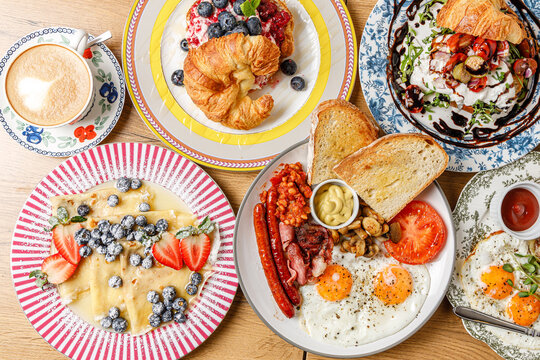 A composition of vintage plates featuring breakfast items