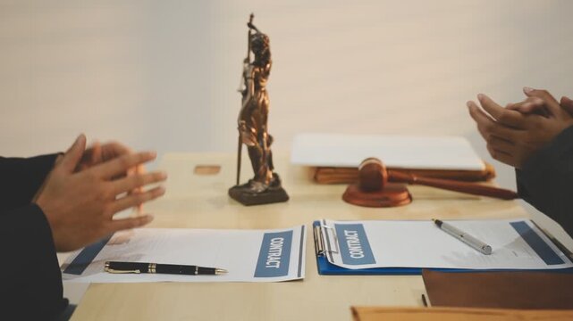 Lawyer explained to the client about the law that must be brought against the court case.
