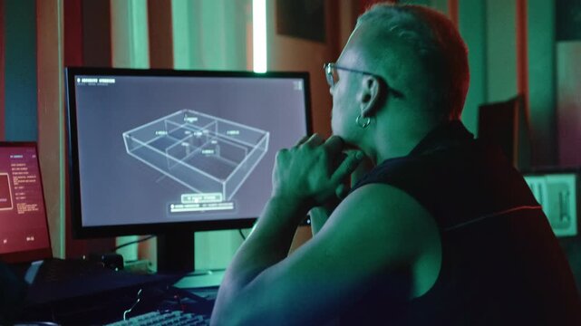 A cyberpunk-inspired technology scene showing an illegal hacker performing fictional digital intrusion activities inside a custom-built container workspace.