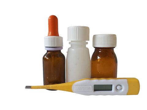 medicine bottle and thermometer