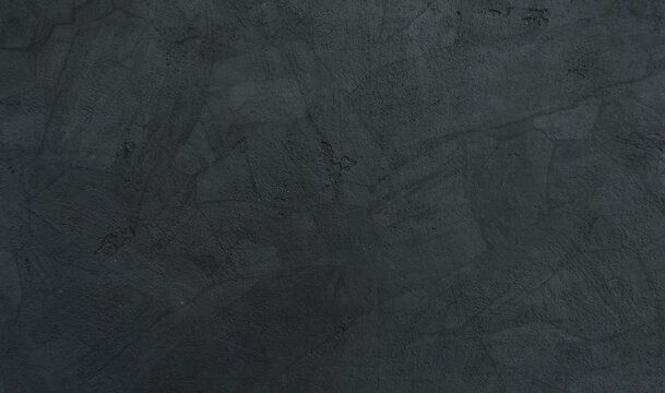 dark black grunge background texture for interior exterior wall decoration , stone rock surface veneer backdrop
