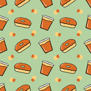 A cup of Thai tea with donuts seamless pattern on a green background.