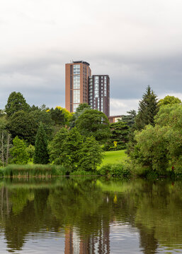 Landscaped parkland with lake and trees at the Vale Village, University of Birmingham, English Midlands, UK