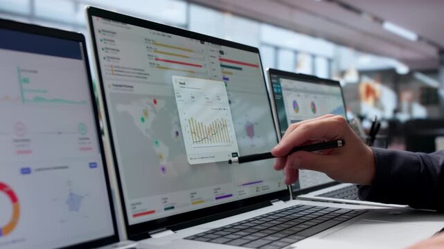 Marketing Manager Analyzes Campaign Data On Laptop