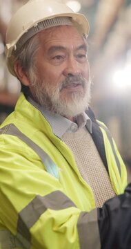 Logistics, discussion and supervisor with plan, task brief and order backlog at warehouse. Flare, man or mature manager with bokeh, delivery coordination or operation instructions in supply chain.