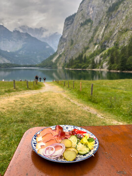 Traditional Snack Platter at an Alpine Pasture near a Mountain Lake, Bavaria, Germany