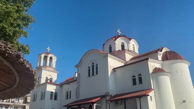 Nipa Umbrella Reveals Holy Church Of Saint Photine, Notable Greek Orthodox Church In Paralia Katerini, Greece.