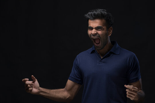 violent young man screaming