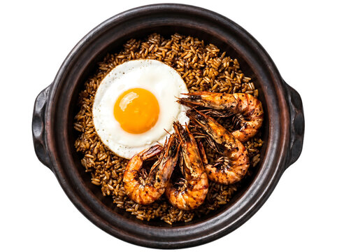 Indonesian seafood fried rice topped with fried egg and prawns in a bowl isolated element on transparent background.