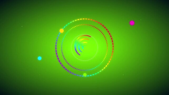Rings rotating in a circular motion surround a multicolored core set against a vivid green gradient backdrop design.