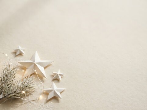 Scandinavian Minimal Christmas Background with Handmade Paper Stars, Pine Branches and Copy Space