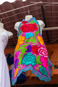 Colorful Hand Embroidered Mexican Apron Displayed at Traditional Artisan Market