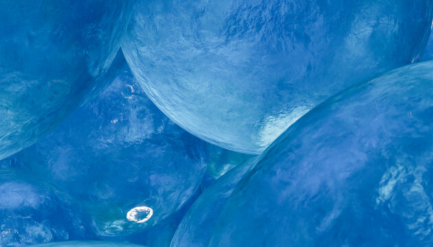 Rendering of translucent blue spheres clustered