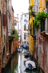 City of Venice, canal, bridge, gondola boats, alley and colorful local buildings and houses  © PaBou