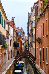 City of Venice, canal, bridge, gondola boats, alley and colorful local buildings and houses  © PaBou