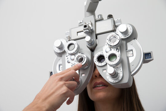 Woman at the optometrist making an eye test