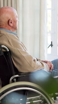 Nursing home, decision and old man in wheelchair, retirement and contemplating future or reflection. Remember, past and senior person with disability, regret and thoughtful with bad memory in house