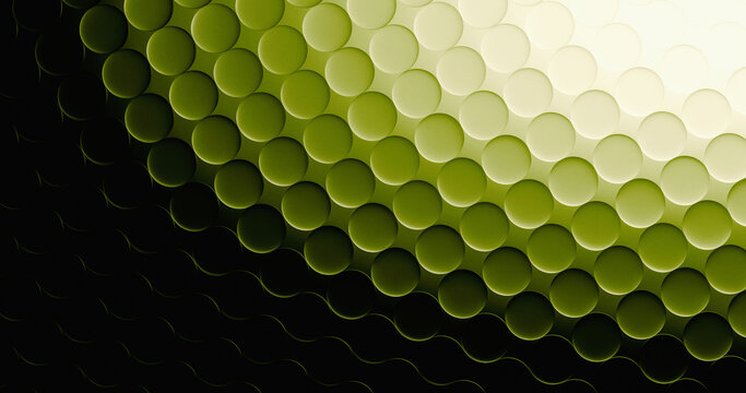 A dense green glass polka dot pattern reflects bright light