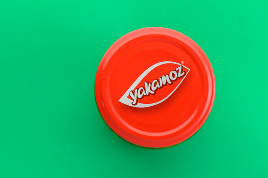 July 28, 2026, Tbilisi, Georgia Top view of Yakamoz jar with red lid on green background