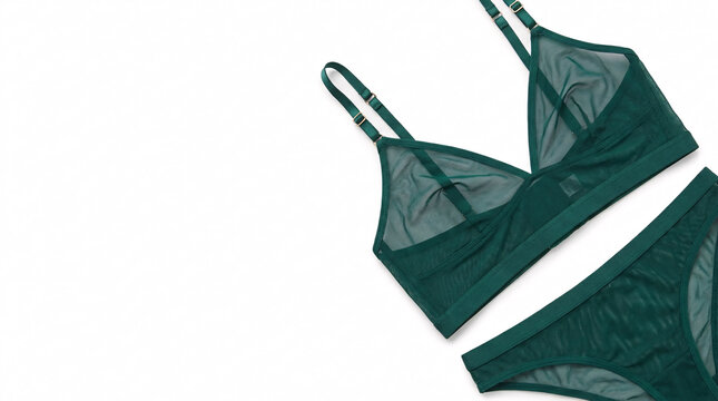 Elegant dark green satin lingerie top with thin adjustable straps displayed on white background.