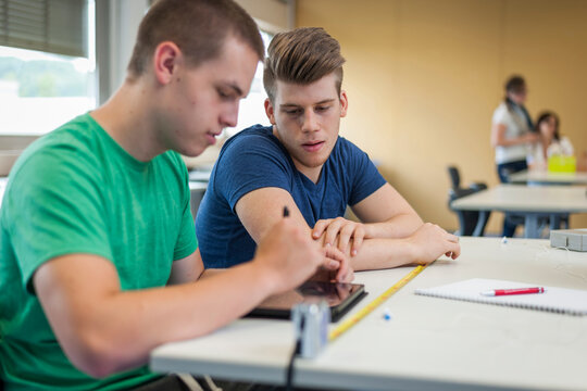 Two vocational school students in class room