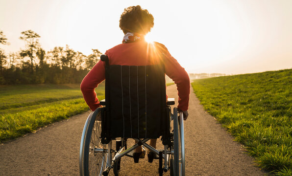 Senior woman in wheelchair in the nature