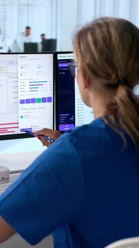 Clinical Trial Manager Reviews Patient Enrollment Data