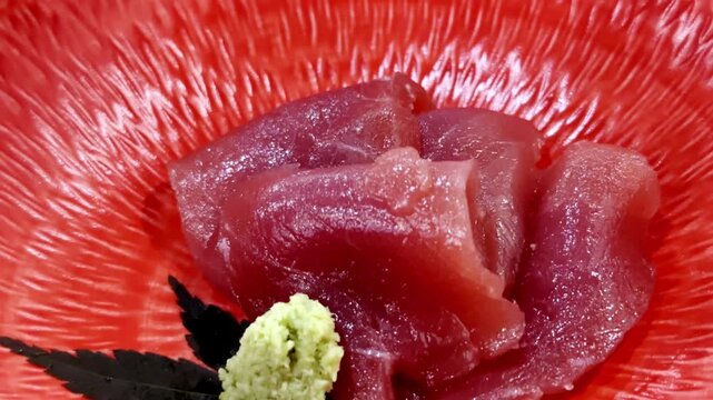 Close-up of premium akami and chutoro tuna sashimi beautifully arranged on a serving plate, highlighting fresh texture and authentic Japanese fine dining.