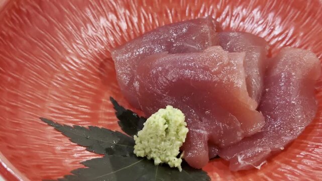 Close-up of premium akami and chutoro tuna sashimi beautifully arranged on a serving plate, highlighting fresh texture and authentic Japanese fine dining.