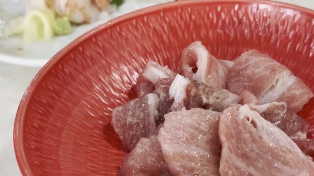 Close-up of premium akami and chutoro tuna sashimi beautifully arranged on a serving plate, highlighting fresh texture and authentic Japanese fine dining.