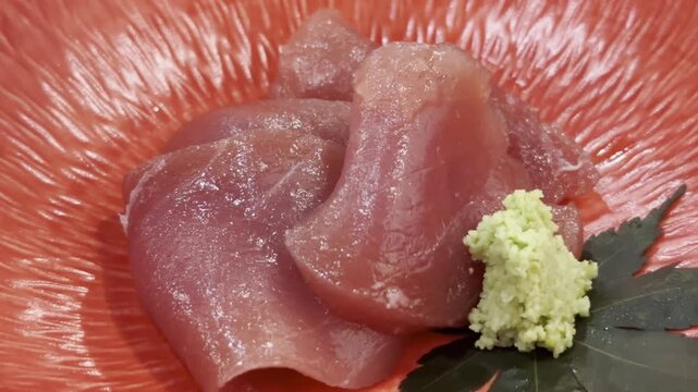 Close-up of premium akami and chutoro tuna sashimi beautifully arranged on a serving plate, highlighting fresh texture and authentic Japanese fine dining.