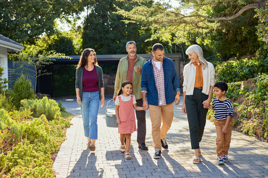 Happy multiethnic family going on a picnic outdoor
