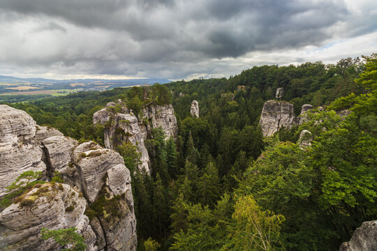 Panoramic view of sandstone rock formations and green pine forest in Bohemian Paradise national park, Czech Republic