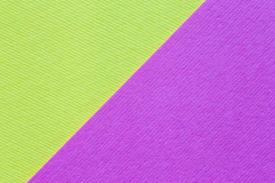 two color backdrop: close up of  lime and magenta sheets of craft cardboard