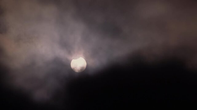 Partial Solar Eclipse of June 10 2021 Visible Through Clouds