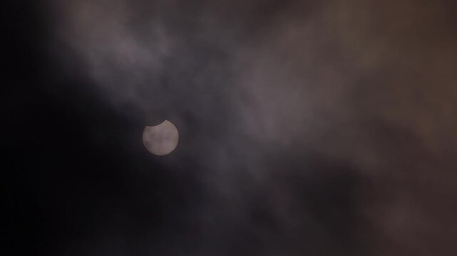 Partial Solar Eclipse of June 10 2021 Visible Through Clouds