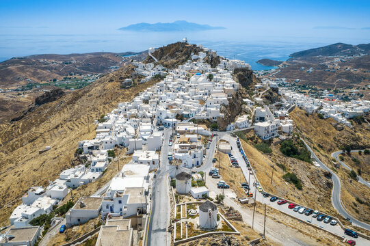 Aerial view of the main town Chora on Serifos island, Cyclades, Greece, high up on a mountain with windmills and whitewashed houses