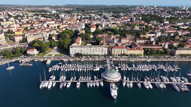 Flight over marina port and yacht harbor in Pula city, Croatia