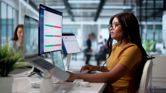 Young Woman Studies Supplier Data On Laptop