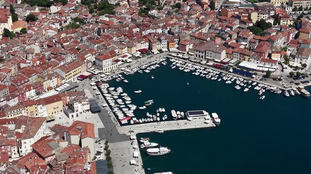Aerial view of old town harbor marina with boat docks in Rovinj city, Croatia