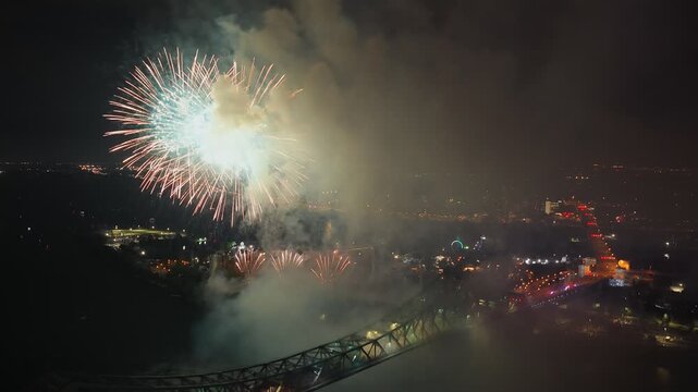 Montreal fireworks over Jacques Cartier Bridge and La Ronde amusement park at night, Quebec, Canada. g.