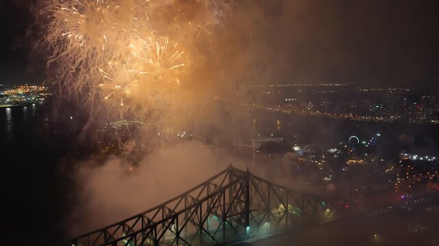 Montreal fireworks over Jacques Cartier Bridge and La Ronde amusement park at night, Quebec, Canada. g.