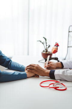 Doctor offering compassionate support and comfort to a patient during a medical consultation, with a gentle hand gesture symbolizing empathy and trust in healthcare