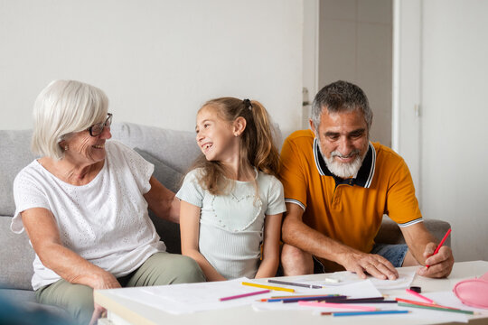 Grandparents spending time with granddaughter