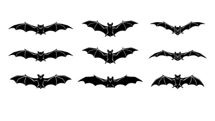 Fototapeta premium Halloween bat silhouettes collection. Flying bat icons for spooky holiday graphic design.