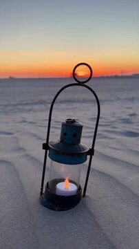 romantic lamp on the sunset beach