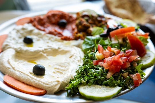 Traditional Middle Eastern Mezze Platter with Hummus Tabbouleh and Olives